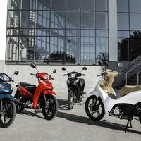 Honda Biz 125 2025: quatro scooters, cores vibrantes, design moderno, ambiente urbano