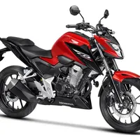 Honda CB 300F Twister 2025: Naked vermelha, 24,5/24,7cv, 25,6/26,2N.m, ABS/CBS, estilo moderno