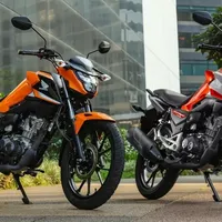 Honda CG 160 Titan 2025: motos laranja e vermelha, design moderno, urbano, 14,7cv, ABS