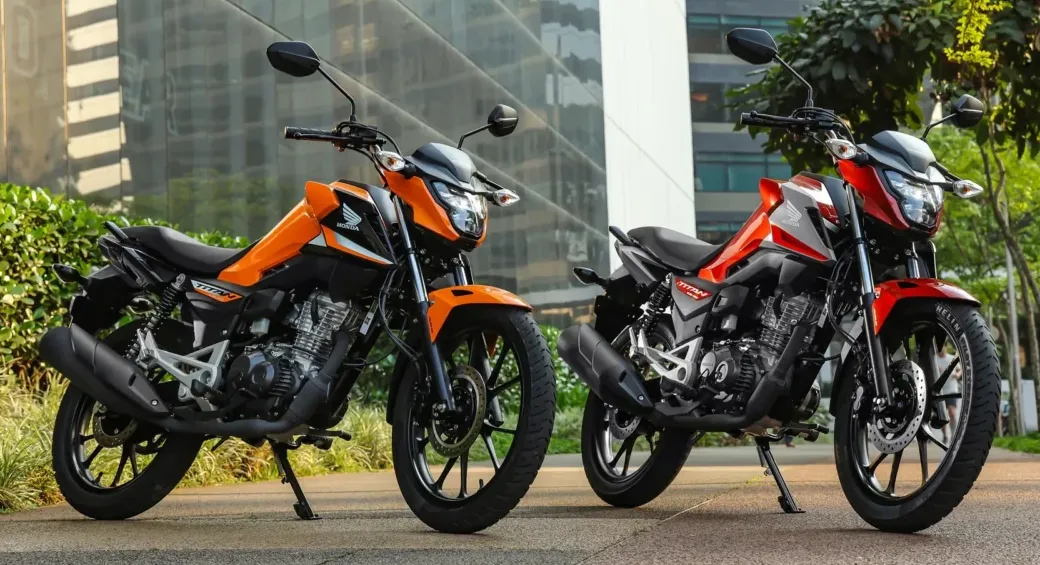 Honda CG 160 Titan 2025: motos laranja e vermelha, design moderno, urbano, 14,7cv, ABS